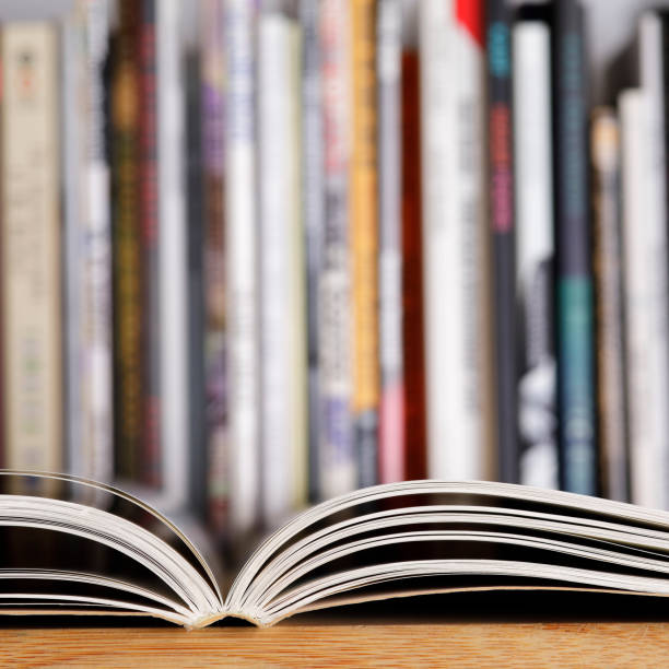 istock Open book close up at the library 1303318600
