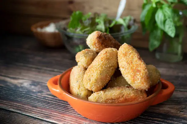 Delicious plate of freshly made and ready-to-eat croquettes. Spanish food photography