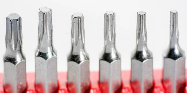 istock Screwdriver bits made from tool steel in the red box photographed against a white background in the studio 1303320013