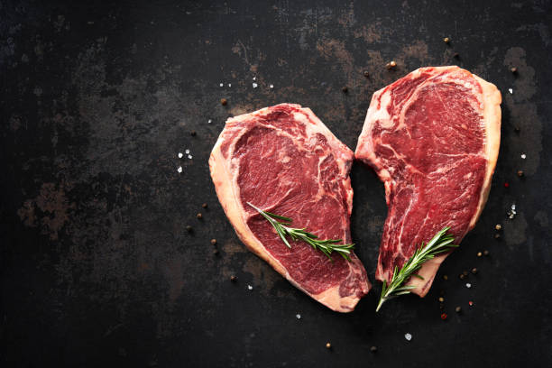 istock Heart shape raw dry aged beef rib steaks (cote de boeuf) 1303324742