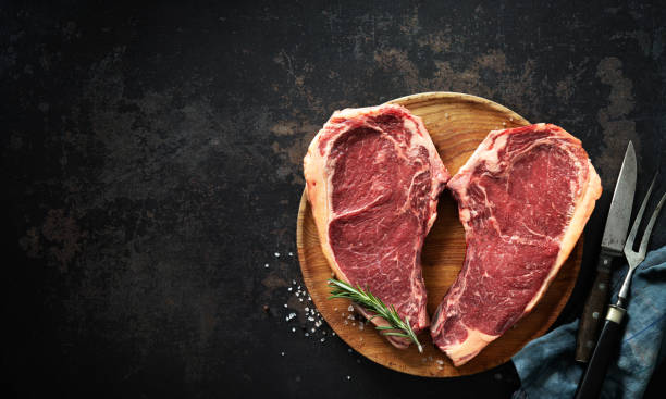 istock Heart shape raw dry aged beef rib steaks (cote de boeuf) 1303324749