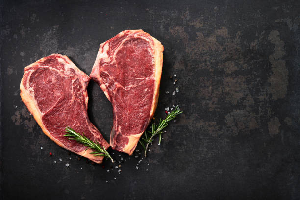 istock Heart shape raw dry aged beef rib steaks (cote de boeuf) 1303324752
