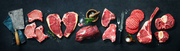 variety of raw cuts of meat, dry aged beef steaks and hamburger patties - carne talho imagens e fotografias de stock