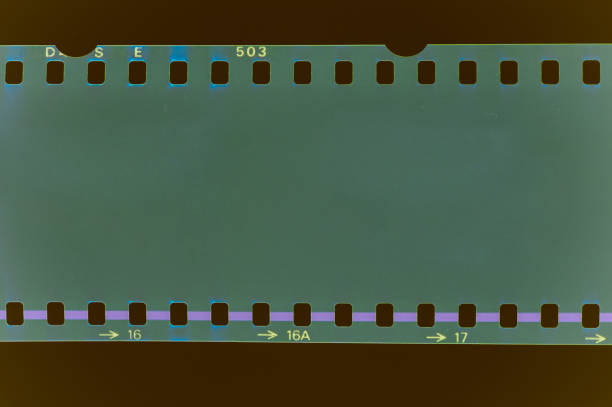 istock Noisy film frame in green color 1303325762