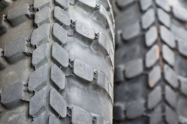 istock Car tires close up. Rubber tread pattern. 1303327020