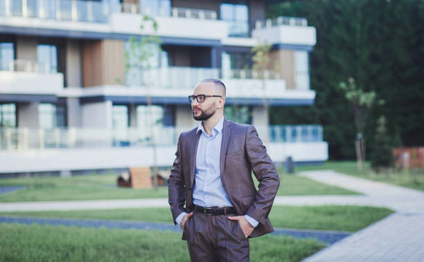 istock Young business man in suit 1303328393