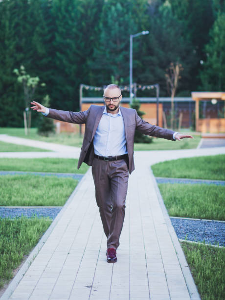 istock young business man is walking 1303328394