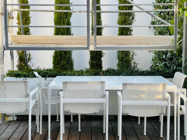 istock House renovation, patio, table and seats 1303330291