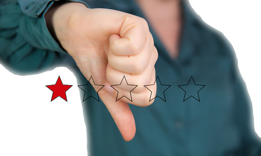 Bad review, Thumb down with red stars for bad service dislike bad quality, Customer experience, rating, social media concept background copy space