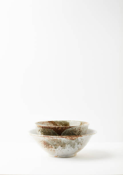 istock Traditional, handcrafted ceramic on bright wooden background. Soft focus. Copy space. 1303330927