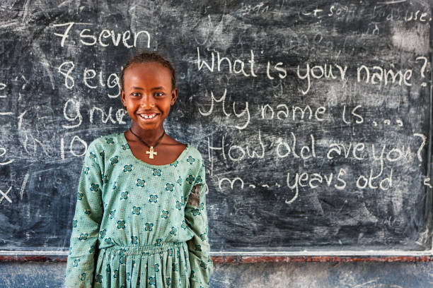 istock African little girl is learning English language 1303332518