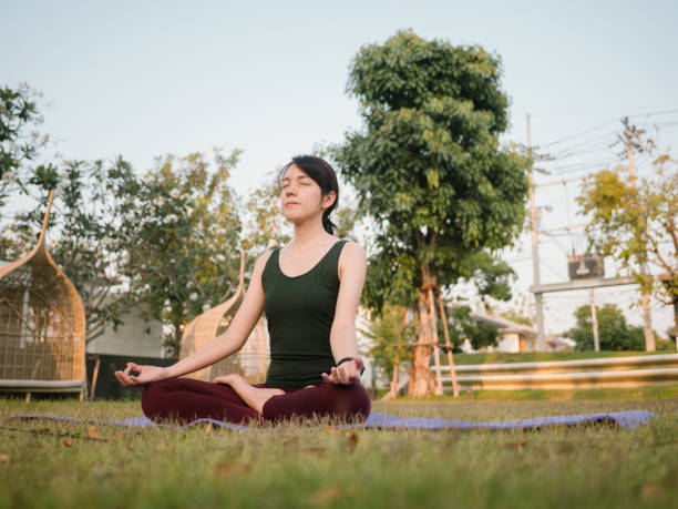 istock Young woman doing yoga. 1303336518