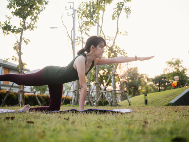 istock Asian female exercise via yoga. 1303336569