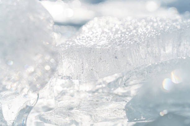 istock Stacks of drift ice piled up against the dutch coast with crystal clear sunlight 1303336573