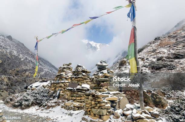 Three Stone Chortens With Prayer Flags Annapurna Circuit Stock Photo - Download Image Now