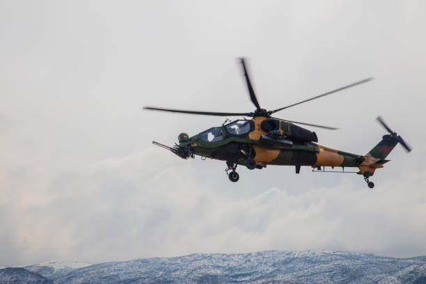 istock T-129 Atak military attack helicopter in flight 1303342185