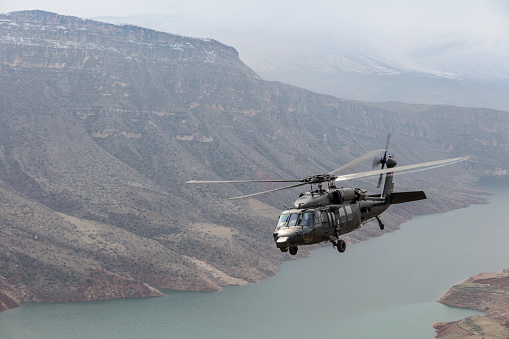 Cosford, UK - 12th June 2022: A H46 Belgian Air Force Agusta A-109HA helicopter flying low to the ground