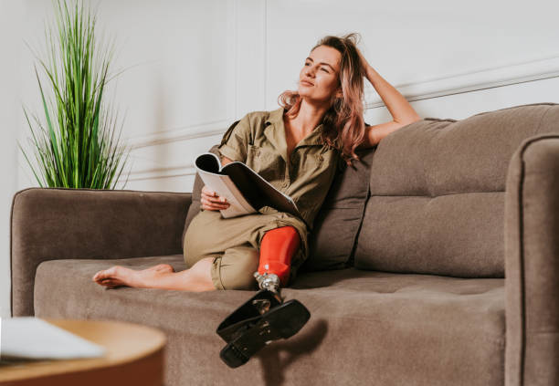 istock Beautiful woman with prosthesis leg 1303343729