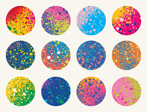 Vector collection of 12 circle shapes made with multicolored paint spray textures. Multicolored and expressive vector images.