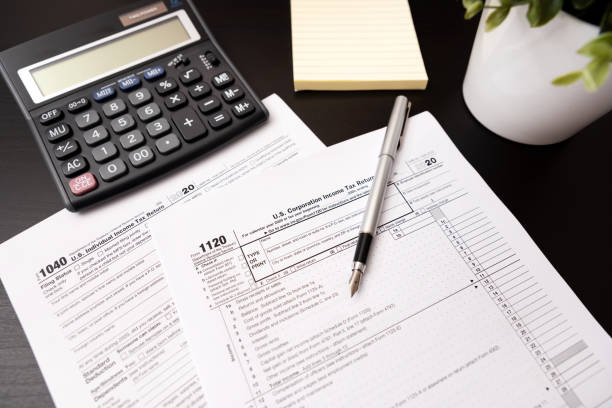 US tax form on desk. Tax income concept US tax form on desk. Tax income 2020 concept section 125 tax stock pictures, royalty-free photos  images