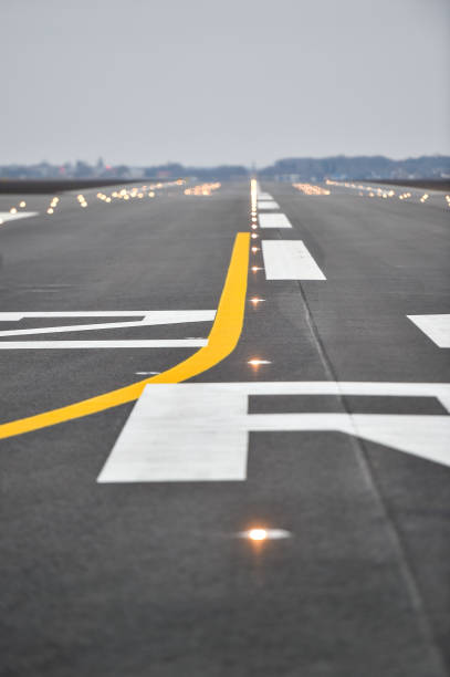 istock Tarmac detail on a newly constructed airplane runway 1303344225