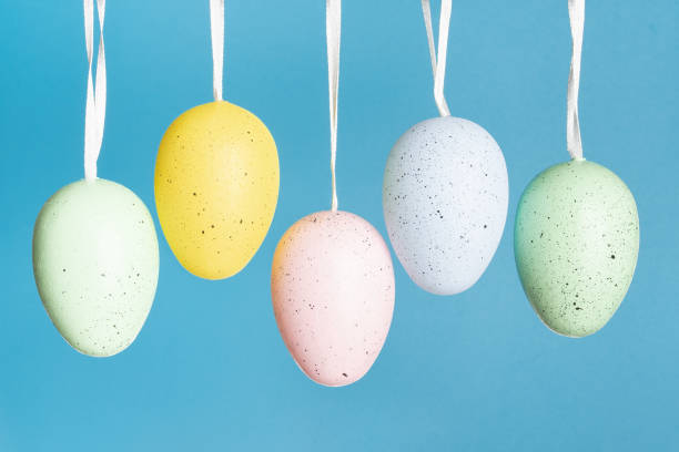 istock Hanging eggs, egg hunt, happy party, spring holiday concept 1303345181