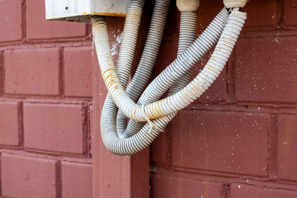 istock Metal box with wires on the wall 1303347968