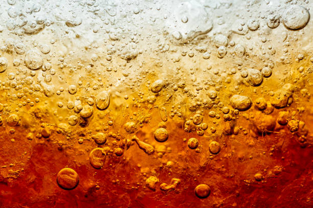 istock Cola with Ice. Food background ,Cola close-up ,design element. Beer bubbles macro,Ice, Bubble, Backgrounds, Ice Cube, Abstract Background 1303350969