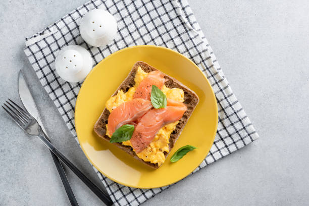 istock Scrambled egg and smoked salmon toast 1303352025