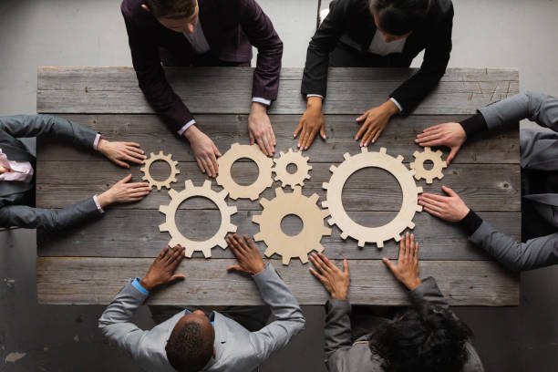 istock Business people connect gear 1303353062