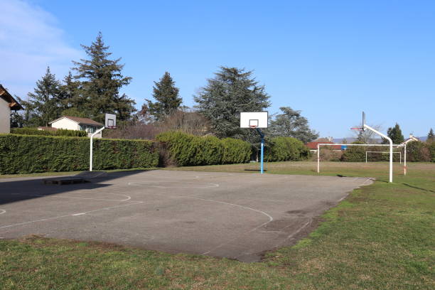 istock Tarred basketball court 1303353374