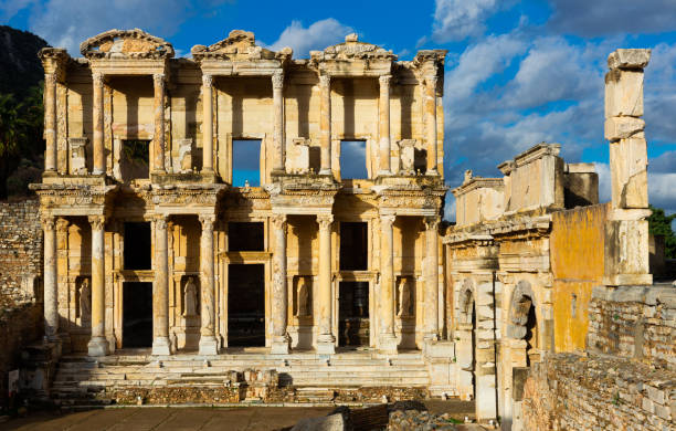 Ruins of Celsius Library and gate of Augustus in Ephesus in ancient city Ephesus Ruins of Celsius Library and gate of Augustus in Ephesus in ancient city Ephesus. Turkey celsus library photos stock pictures, royalty-free photos & images