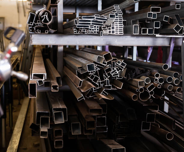 istock Iron tubes, pipes, profiles on rack 1303354416