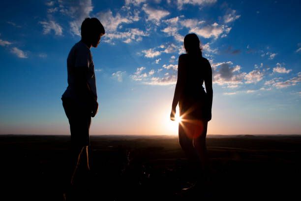 istock Silhouettes with blue sky during sunset 1303357269