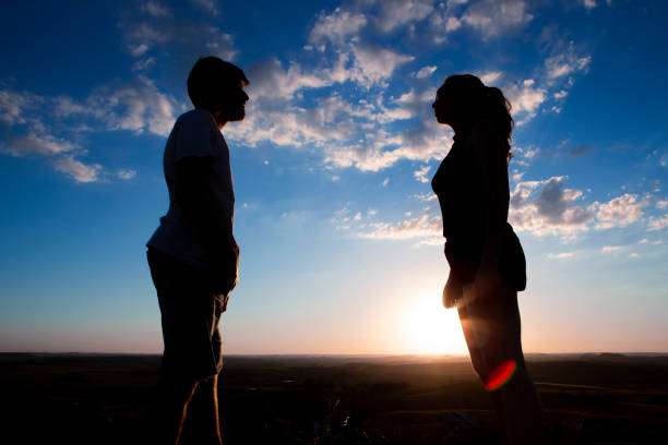 istock Silhouettes with blue sky during sunset 1303357321