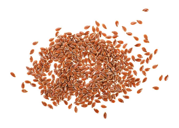 istock Brown flax seeds isolated on a white background. Top view. 1303360650