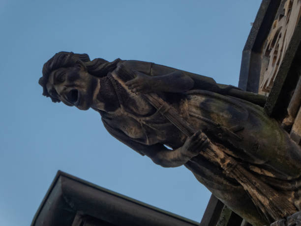 istock Stone gargoyle on an old Prague building 1303360904