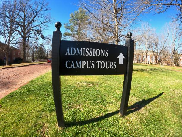 istock Admissions campus tour sign 1303360960