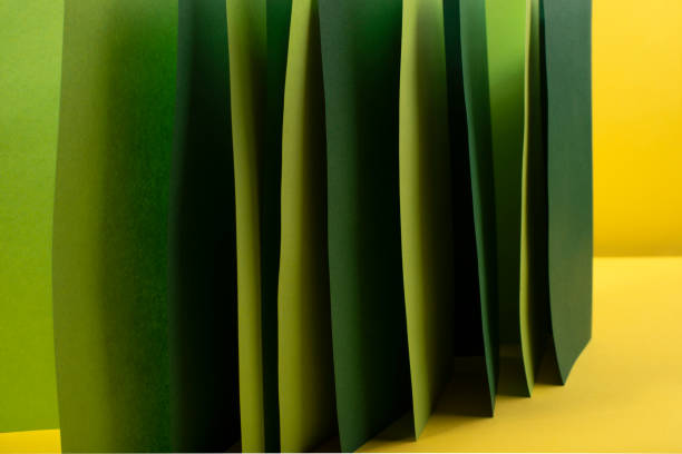 istock Abstract colour paper background. Green geometric shape. 1303361001