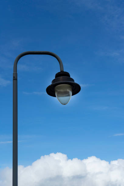 istock Lighting streetlight with blue sky and cloud background 1303362950