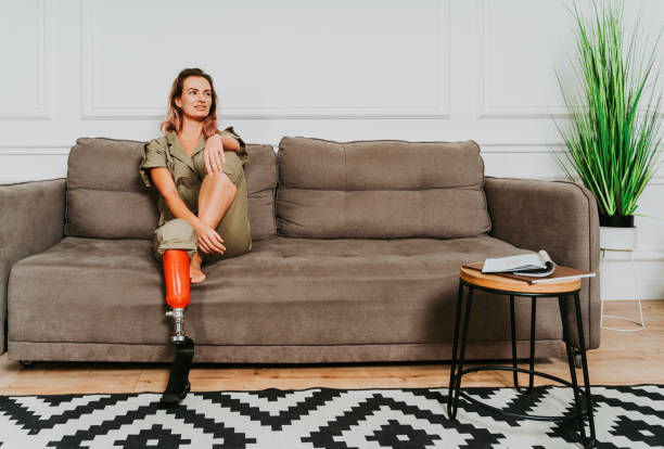 istock Beautiful woman with prosthesis leg 1303365054