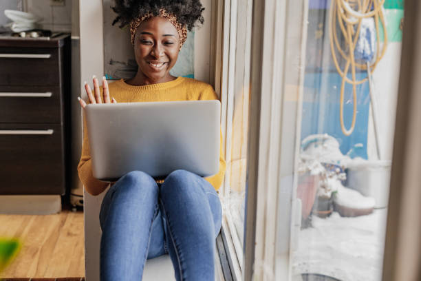 istock Young Woman is communicating on a video call at home 1303365535