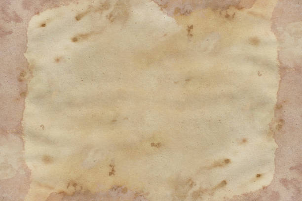 istock Old brown paper grunge background. Abstract liquid coffee color texture. 1303366488