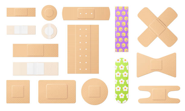 Set of medical patches and adhesive bandages isolated on white background, 3d templates Set of medical patches and adhesive bandages isolated on white background, 3d templates back and front view, colorful and of different shapes. Vector illustration adhesive bandage stock illustrations