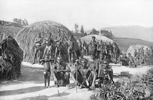 AmaZulu tribe at a Zulu kraal (village) in the Kingdom of Zululand, South Africa. Vintage photo etching circa 19th century. It was absorbed into the British Colony of Natal in 1897, and then the Union of South Africa in 1910.