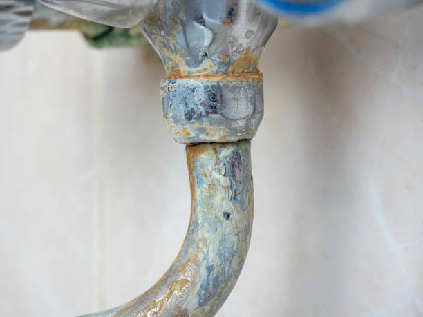 istock close-up of rust on the faucet. Peeling chrome. Problem with water hardness 1303370197