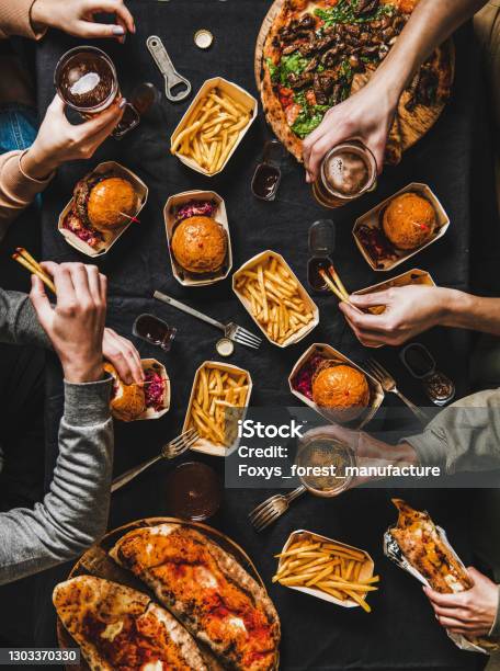 Flatlay Of Friends Having Quarantine Home Party With Fast Food Stock Photo - Download Image Now
