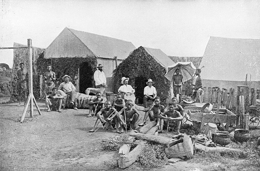 Independent diamond mine owners and miners in Kimberley, South Africa. Vintage photo etching circa 19th century.