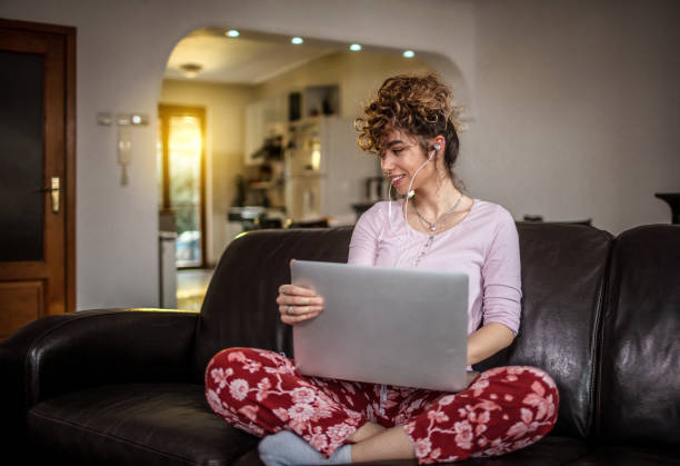 istock Woman working at home on sofa 1303377070