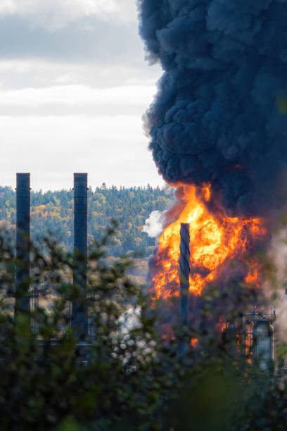 istock Explosion and fire at an oil refinery 1303386930
